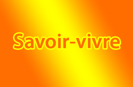 Pomarańczowa kartka z napisem savoir vivre